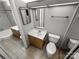 Bathroom with two vanities, two toilets, and a shower/bathtub at 4824 Spring Lake Dr # E, Charlotte, NC 28212