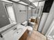 Full bath features two toilets, dual sinks, vanity and sliding glass door at 4824 Spring Lake Dr # E, Charlotte, NC 28212