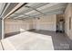 Spacious two car garage, offering ample parking, lots of overhead space, and a door to the house at 5025 Cherry Gum Ct # 47, Matthews, NC 28105