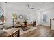 Bright and inviting living room with hardwood floors, natural light, and neutral decor at 5025 Cherry Gum Ct # 47, Matthews, NC 28105