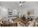 Open-concept living area flows into kitchen, featuring hardwood floors and neutral decor at 5025 Cherry Gum Ct # 47, Matthews, NC 28105