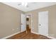 Bedroom featuring wood-look floors, neutral-colored walls, and a view into the hallway at 605 Gable Dr, Rock Hill, SC 29732