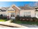 Attractive single-level home with a neatly landscaped yard, covered entry, and bright, welcoming facade at 605 Gable Dr, Rock Hill, SC 29732