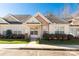 Inviting single-story home featuring manicured landscaping, a cozy front porch, and neutral siding at 605 Gable Dr, Rock Hill, SC 29732