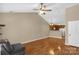 Open-concept living space boasts wood floors, neutral walls, and a ceiling fan at 605 Gable Dr, Rock Hill, SC 29732