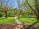 Spacious backyard with hot tub, gazebo, swing set and lush green grass at 6349 Lebanon Rd, Mint Hill, NC 28227