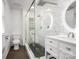 Modern bathroom with glass enclosed shower, white marble tile, dual shower heads, and elegant lighting at 6349 Lebanon Rd, Mint Hill, NC 28227