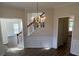 This dining room features hardwood floors and elegant chair rail molding at 6827 Neuhoff Ln, Charlotte, NC 28269