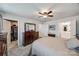 Spacious main bedroom with an ensuite bathroom, walk-in closet, dresser, and windows providing natural light at 715 Bonica Ct, Lancaster, SC 29720