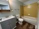 Bathroom featuring a vanity with storage, toilet and shower at 7939 Holly Hill Rd, Charlotte, NC 28227