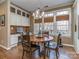 Bright breakfast nook with custom built-ins, and a view of the backyard at 8111 Sealey Ct, Charlotte, NC 28277