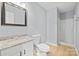 Bright bathroom with granite countertop vanity and a glass-enclosed shower at 8733 Canter Post Dr, Charlotte, NC 28216