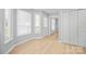 Cozy bonus room with hardwood floors, natural light, and modern fixtures at 8733 Canter Post Dr, Charlotte, NC 28216
