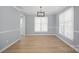 Inviting living area with hardwood floors, natural light, and contemporary finishes at 8733 Canter Post Dr, Charlotte, NC 28216