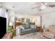 Open-concept living space flows to kitchen, dining area with hardwood floors and neutral walls at 9740 Wardley Dr, Charlotte, NC 28215