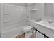Bathroom with a white vanity, toilet, tub, and shower combination with open storage shelving at 1008 Bose Ave, Rock Hill, SC 29732