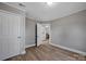 A bedroom featuring modern floors, neutral walls, and closet space at 1008 Bose Ave, Rock Hill, SC 29732