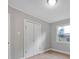 A bright bedroom featuring modern floors, neutral walls, and closet space at 1008 Bose Ave, Rock Hill, SC 29732
