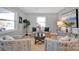 Bright living room featuring neutral walls, modern furnishings, and natural light from a large window at 1008 Bose Ave, Rock Hill, SC 29732