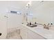 Bathroom featuring double sinks, neutral tile, and a shower/tub with white shower curtain at 10521 Ardley Manor Dr, Mint Hill, NC 28227
