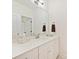 Bathroom featuring a single sink vanity and a large mirror at 10521 Ardley Manor Dr, Mint Hill, NC 28227