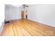 Bright living room with gleaming hardwood floors, offering a warm and inviting space at 108 W Jefferson St, York, SC 29745