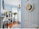 Bright bathroom with blue walls, decorative rug, and natural lighting at 12 Church St, York, SC 29745