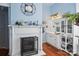 Elegant bathroom featuring white accents, a fireplace, and hardwood floors at 12 Church St, York, SC 29745