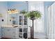 Bathroom features a white vanity and cabinet plus a decorative plant stand at 12 Church St, York, SC 29745