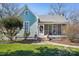 Charming bungalow-style home with a screened-in front porch and mature landscaping at 12 Church St, York, SC 29745