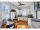 Bright kitchen with white cabinets, stainless steel appliances, and a breakfast nook at 12 Church St, York, SC 29745