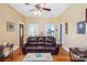 Bright living room with hardwood floors and comfortable seating arrangements at 12 Church St, York, SC 29745