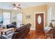 Spacious living room featuring hardwood floors and a classic, inviting design at 12 Church St, York, SC 29745