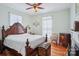 Spacious bedroom featuring a large bed, hardwood floors, and natural light at 12 Church St, York, SC 29745