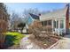 View of the home's side yard with a stone walkway and a screened-in porch at 12 Church St, York, SC 29745