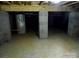 Unfinished basement with concrete floor and block pillars at 1202 Louise Ln, Albemarle, NC 28001