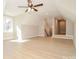 Spacious bonus room features a ceiling fan and natural light at 1202 Louise Ln, Albemarle, NC 28001