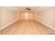 Spacious bonus room offers flexible living and a modern ceiling fan at 1202 Louise Ln, Albemarle, NC 28001