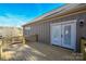 New wooden deck with access from the home, ideal for outdoor living and entertaining at 1202 Louise Ln, Albemarle, NC 28001