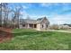 Charming brick home with a well-manicured lawn and beautiful landscaping, offering great curb appeal at 1202 Louise Ln, Albemarle, NC 28001