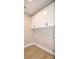 Convenient laundry area featuring modern cabinets and washer hookup at 1202 Louise Ln, Albemarle, NC 28001
