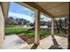 View from the covered porch, showcasing the neighborhood and natural surroundings at 1202 Louise Ln, Albemarle, NC 28001