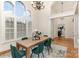 Bright dining room with a large window and hardwood floors at 125 Whiterock Dr, Mount Holly, NC 28120