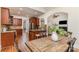 Open kitchen view showcasing wood cabinets, granite countertops, and stainless steel appliances at 125 Whiterock Dr, Mount Holly, NC 28120