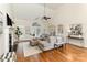 Spacious living room with a fireplace, hardwood floors, and vaulted ceilings at 125 Whiterock Dr, Mount Holly, NC 28120