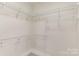 Walk-in closet with wire shelving; ready for all your storage needs at 125 Whiterock Dr, Mount Holly, NC 28120