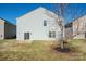 Spacious backyard features a patio, perfect for outdoor entertaining or relaxation at 12820 Settlers Trail Ct, Charlotte, NC 28278