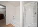 Bathroom featuring a separate tub and shower, and neutral wall paint at 12820 Settlers Trail Ct, Charlotte, NC 28278