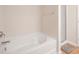 Bathroom featuring a separate tub and shower, and neutral wall paint at 12820 Settlers Trail Ct, Charlotte, NC 28278