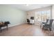 Office featuring neutral wall paint, a desk and light colored hardwood floors at 12820 Settlers Trail Ct, Charlotte, NC 28278